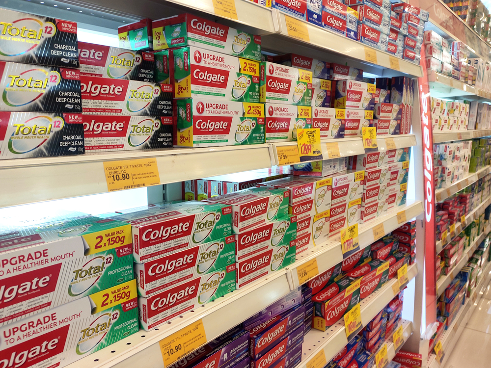 OTC teeth whitening products, toothpaste on a store shelf